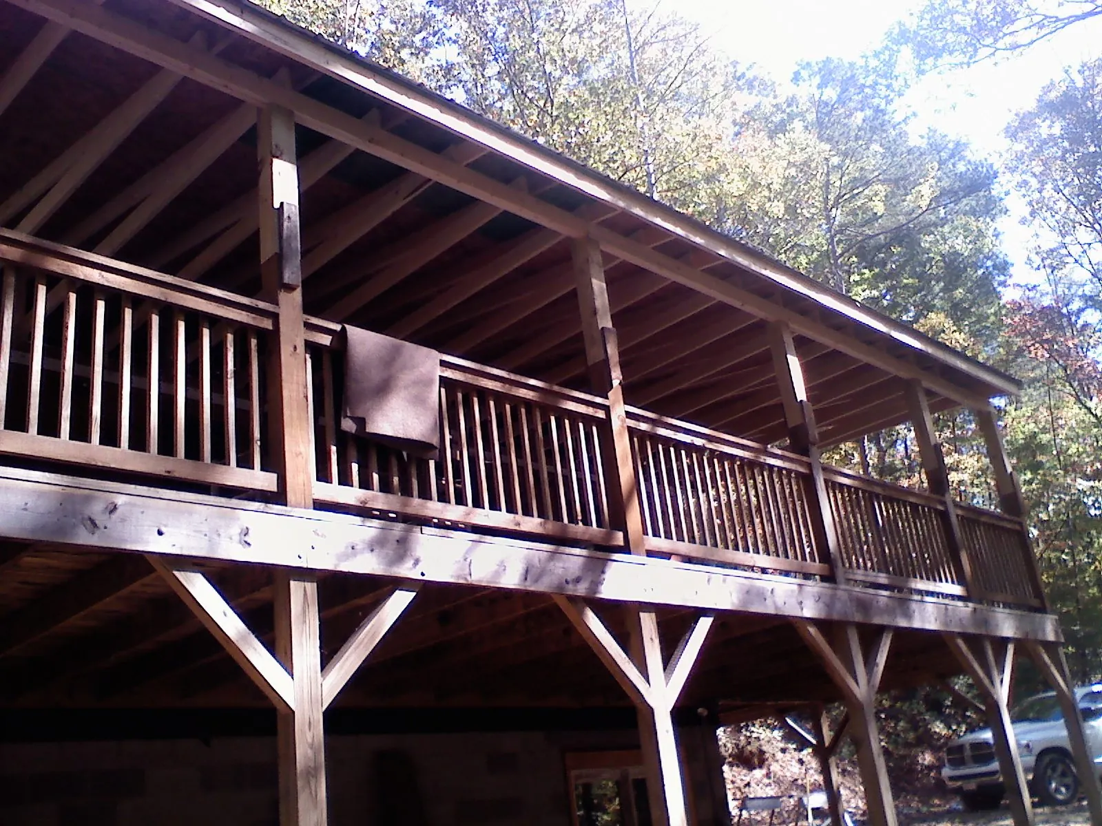 Timber framing under a new elevated porch and deck — Roof Leak Repair in Stamford by Roofing Brothers